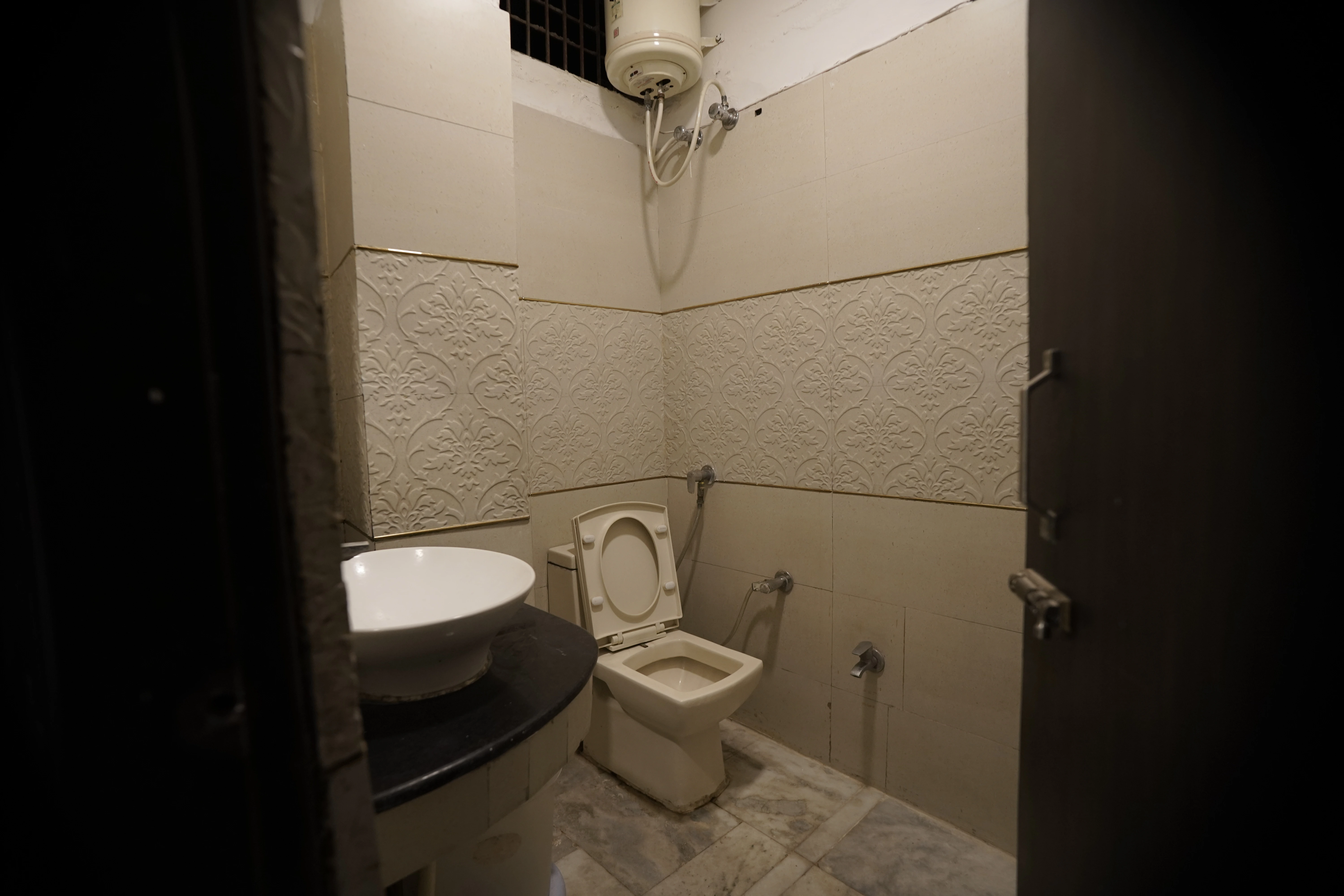 Deluxe Room attached washroom with fresh towels and toiletries
